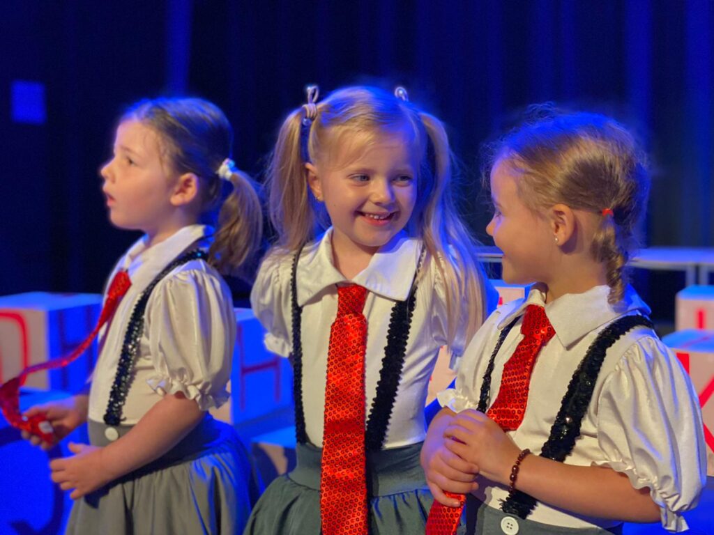 Junior musical theatre students in a show